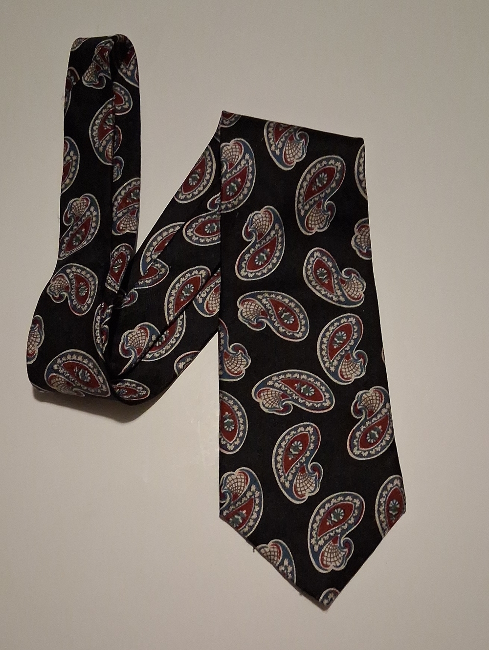 Don Loper100% Silk Black Paisley Men's Tie with Red and Cream Accents.
